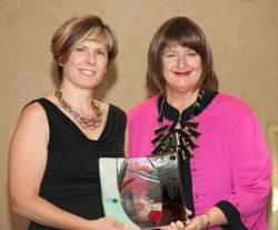 Synergy D&C presents "Woman of Distinction" Award